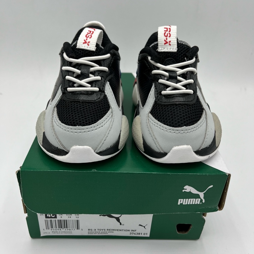 Puma RS-X
Size 4c Toddler 
Brand New/ never worn 
Black/multicolor 
Original Box - Picture 3 of 9